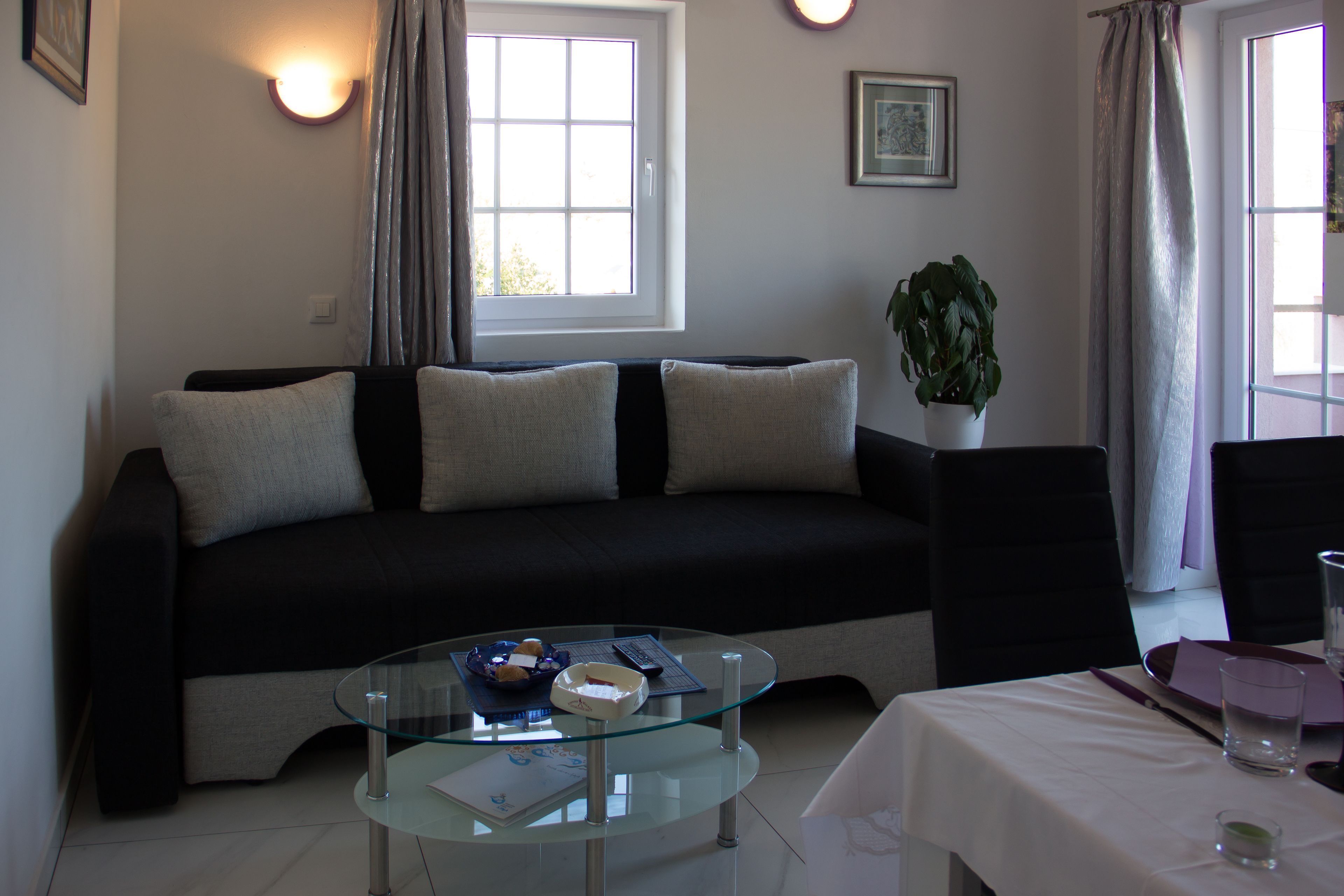 Comfort appartement, uitzicht op zee | Woonruimte | Een flatscreentelevisie