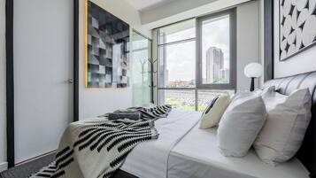 Laptop workspace, blackout curtains, soundproofing, iron/ironing board