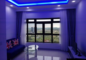 Suite | Living area | 32-inch LCD TV with satellite channels, TV