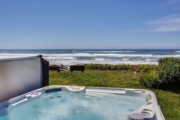 Take time to relax in the hot tub with ocean views.