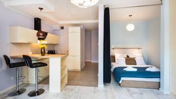 Apartamento Deluxe (Swarozyca 15b/12) | Zona de estar | Una televisión de pantalla plana