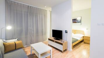 Superior Apartment | Living area | Flat-screen TV