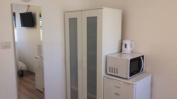Economy Quadruple Room, 2 Double Beds | Mini fridge