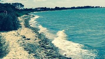 En la playa y toallas de playa