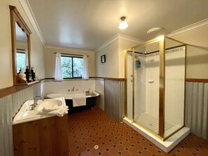 Bathtub, eco-friendly toiletries, hair dryer, towels