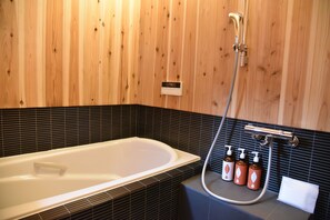 Private Vacation Home | Bathroom | Combined shower/tub, free toiletries, hair dryer, slippers