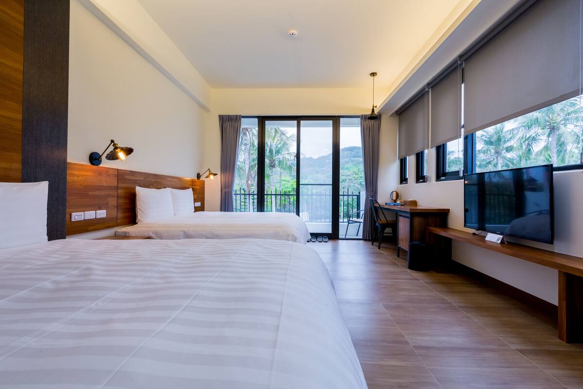Standard Quadruple Room | Minibar (free items), desk, blackout drapes, soundproofing