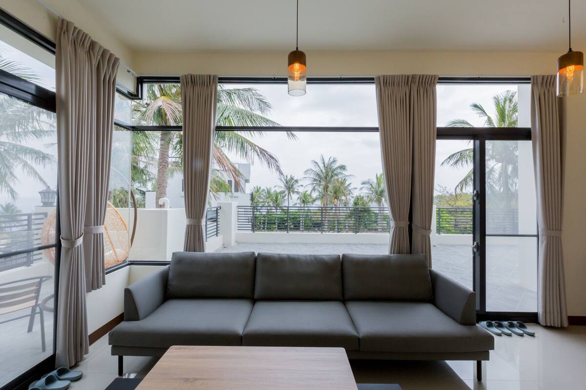 Sea View VIP Deluxe Quad Room | Minibar (free items), desk, blackout drapes, soundproofing