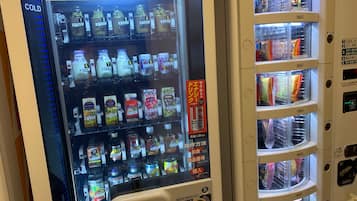 A vending machine with multiple compartments, each containing different items.