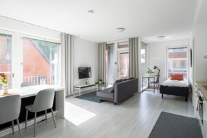 Standard Apartment, 2 Bedrooms | Living area | 39-inch flat-screen TV with cable channels, TV