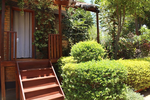 Family Quadruple Room | In-room safe, individually decorated, individually furnished, desk