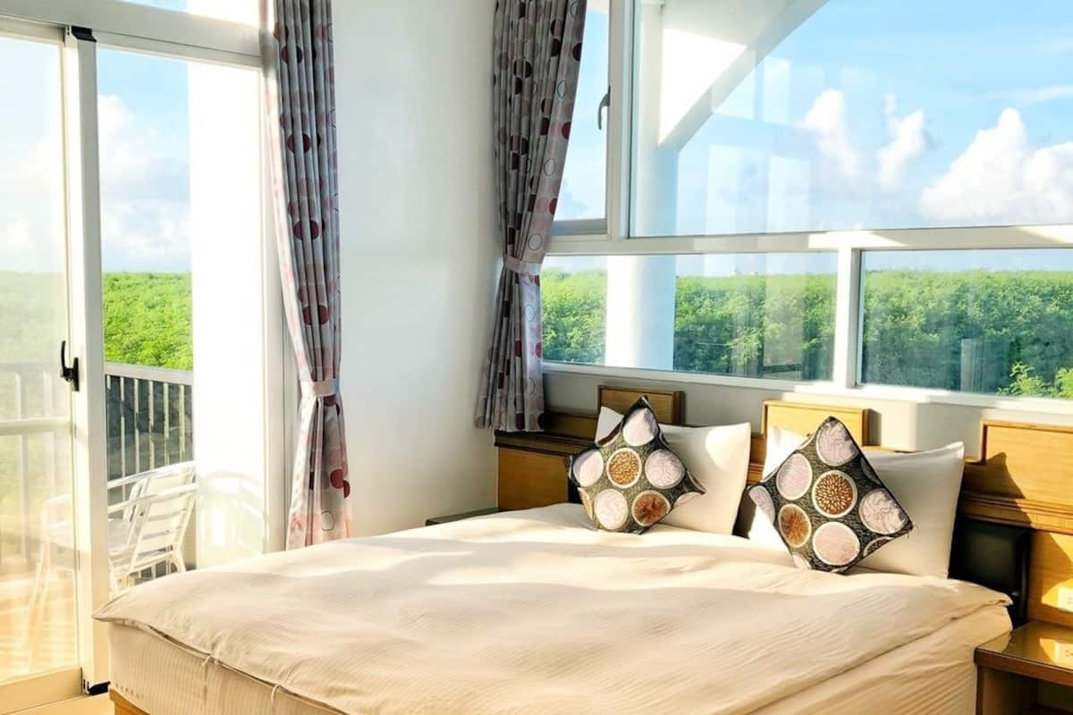 Chambre Double Deluxe | Literie de qualité supérieure, décoration personnalisée