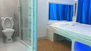Shower, free toiletries, hair dryer, slippers