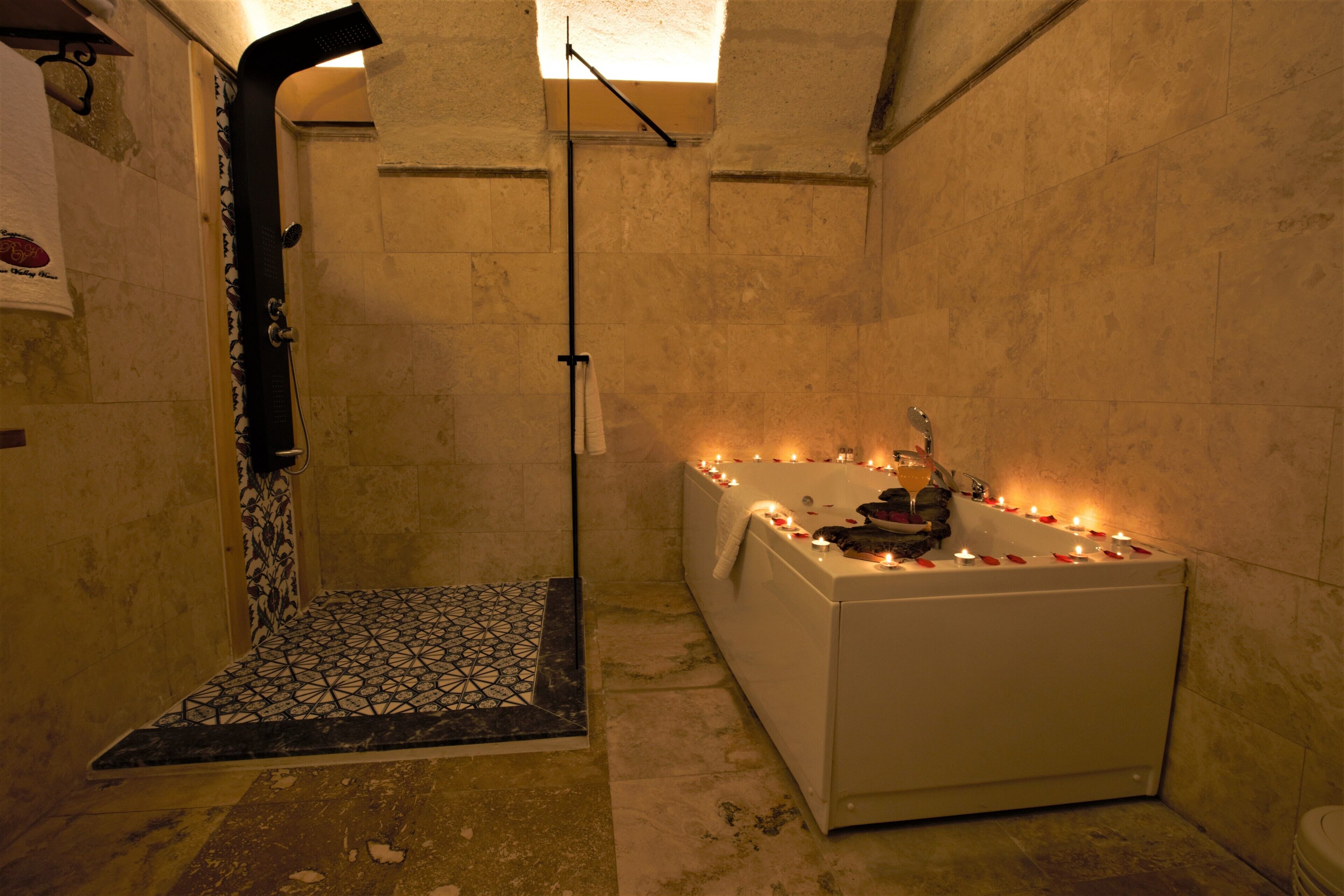 honeymoon room | bathroom | shower, hydromassage showerhead, free toiletries, hair dryer