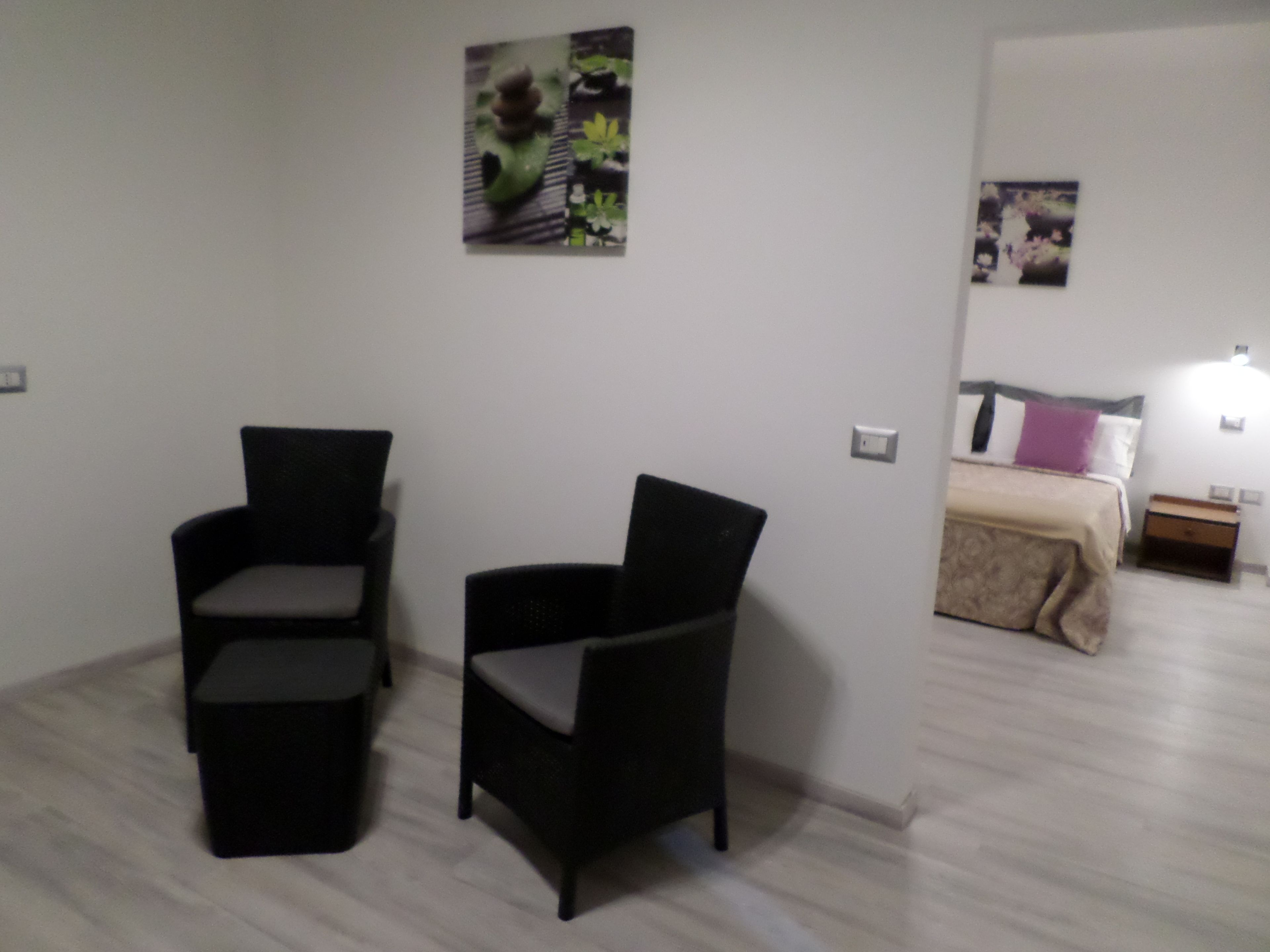 family suite, balcony, lake view | living area