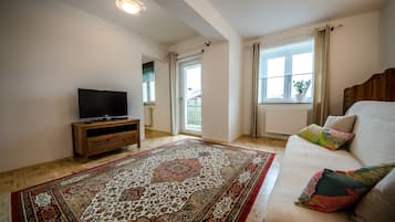 Comfort Apartment | Living room | 95-cm LCD TV with digital channels, TV