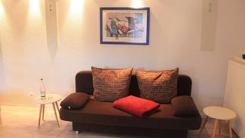 Apartemen Comfort, beberapa kamar, pemandangan kebun, area taman | Area keluarga | TV layar datar