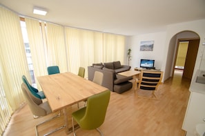 Apartment (Zell City) | Living area | Flat-screen TV