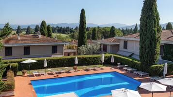 Seasonal outdoor pool, pool umbrellas, pool loungers