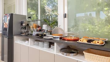 Daily buffet breakfast (EUR 12.50 per person)