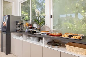 Daily buffet breakfast (EUR 12.50 per person)