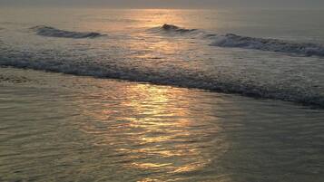 On the beach, sun loungers