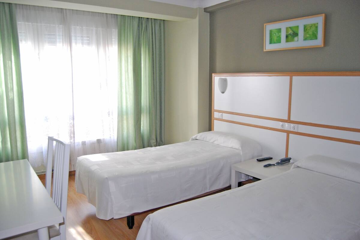 Desk, free cots/infant beds, free WiFi, bed sheets
