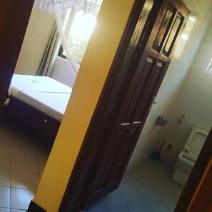 Shower, free toiletries, slippers, towels