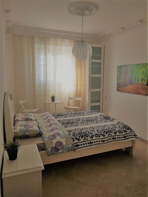 Economy Double Room, Shared Bathroom | In-room safe, desk, iron/ironing board, free WiFi