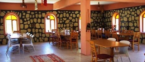 Breakfast, lunch, dinner served; local cuisine