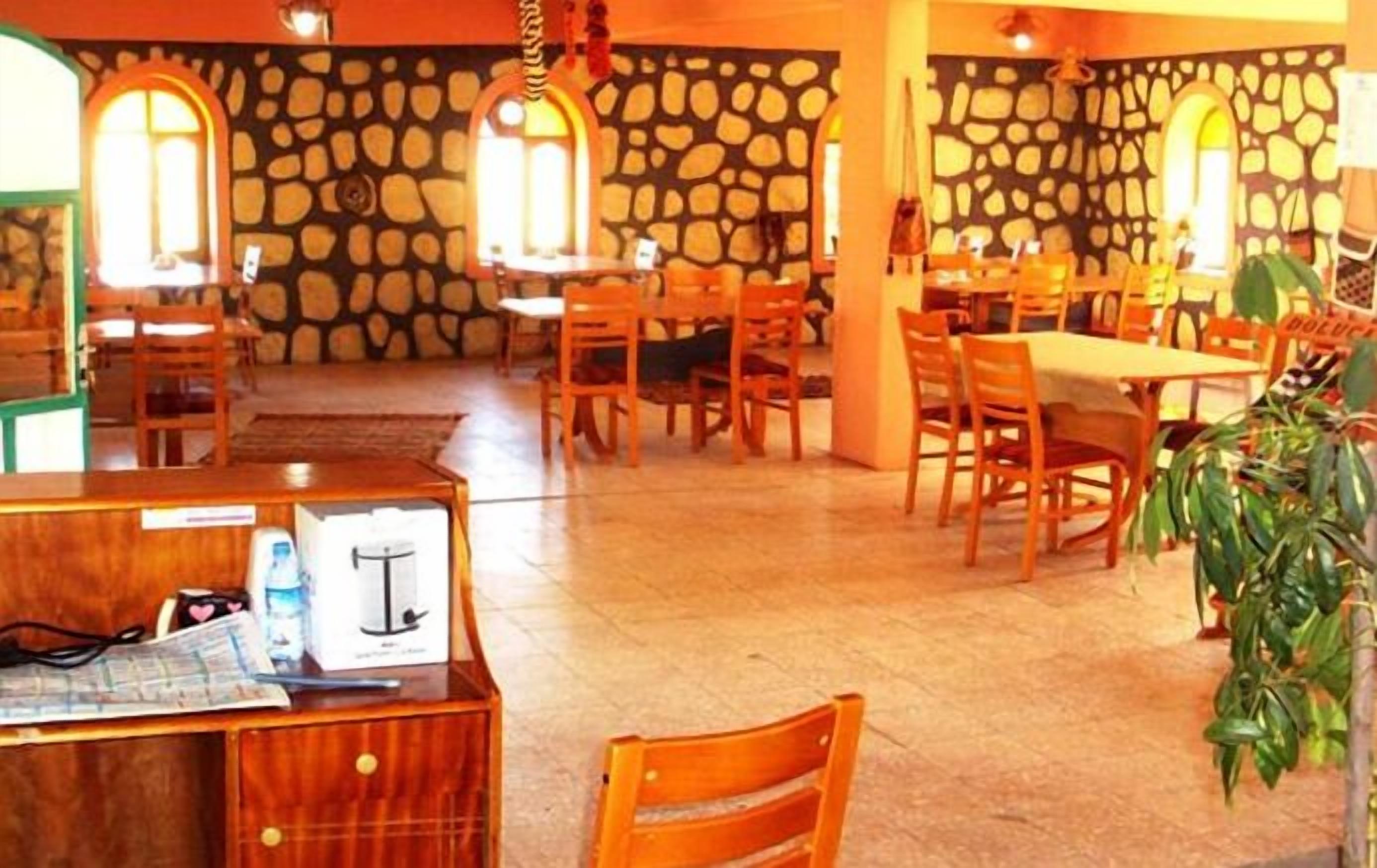 Breakfast, lunch, dinner served; local cuisine 