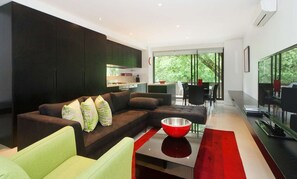 Departamento, 2 habitaciones | Sala de estar | Televisión, Netflix y reproductor de DVD 