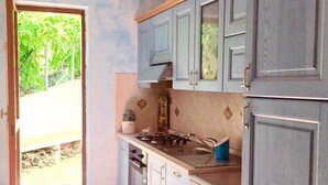Apartment, 4 Bedrooms | Private kitchen - Caletta Apartment in Villa I (Siniscola)