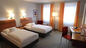 Roba de llit d'alta qualitat i caixa forta a l'habitació