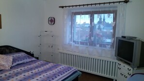 Family Suite, 3 Bedrooms, Balcony | 1 bedroom, desk, blackout drapes, iron/ironing board
