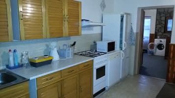 Family Suite, 3 Bedrooms, Balcony | Private kitchen | Full-size fridge, microwave, stovetop, dishwasher