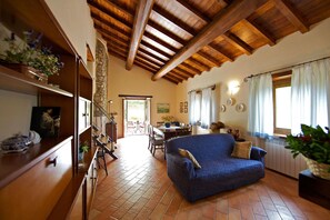 Villa, 4 Bedrooms | Living area | Flat-screen TV, fireplace, DVD player, table tennis