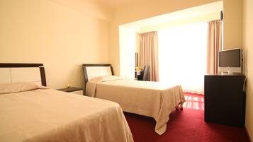 Habitación Confort con 2 camas individuales, 2 camas individuales | Caja fuerte, escritorio, camas supletorias y wifi gratis