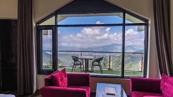 Deluxe dubbelrum eller tvÄbÀddsrum - 1 kingsize-sÀng - utsikt mot trÀdgÄrden | Utsikt frÄn boendet