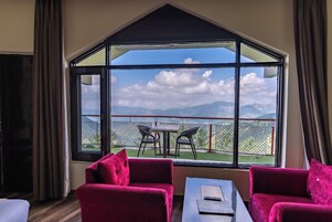 Habitación Deluxe con 1 cama doble o 2 individuales, 1 cama de matrimonio grande, vistas al jardín | Vistas desde el alojamiento