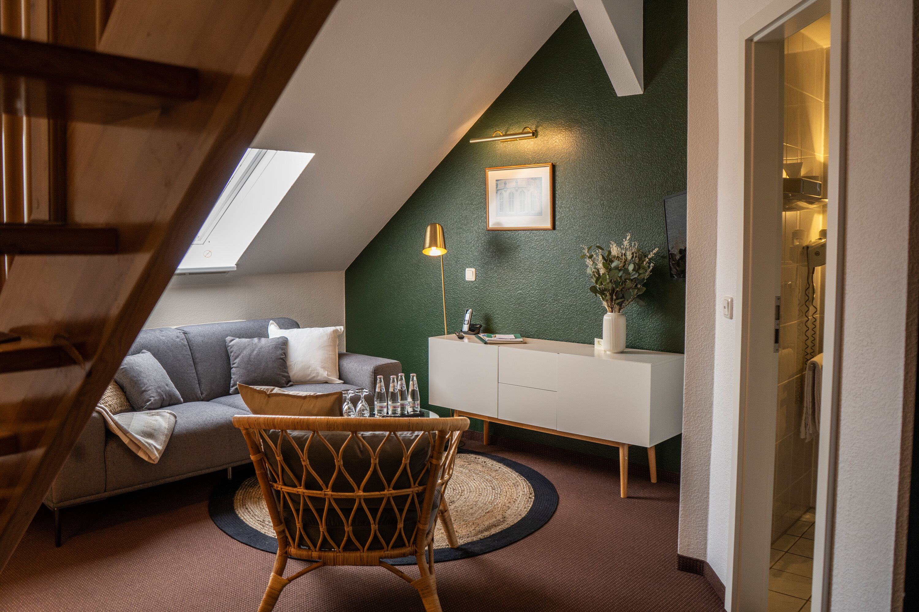 family quadruple room | living area | flat-screen tv