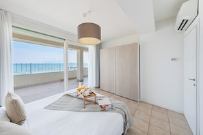 Appartamento, 2 camere da letto, vista lago | Ferro/asse da stiro, Wi-Fi gratuito, lenzuola