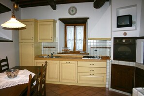 Villa, 4 Bedrooms | Private kitchen | Full-size fridge, microwave, oven, stovetop - Wonderful private villa with private pool, A/C, WIFI, TV, pets allowed and parking, close to Are... (Subbiano)