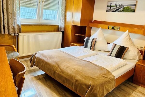 Standard Double Room | Minibar, in-room safe, desk, iron/ironing board