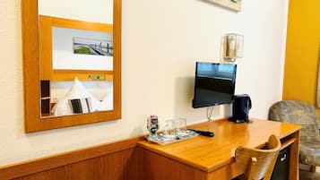 Standard Double Room | Minibar, in-room safe, desk, iron/ironing board