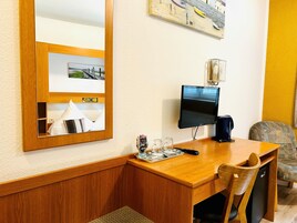Standard Double Room | Minibar, in-room safe, desk, iron/ironing board