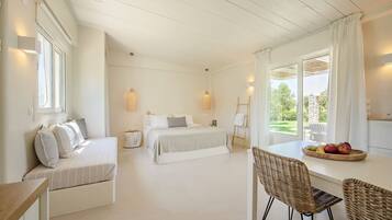 Studio | 2 bedrooms, premium bedding, in-room safe, individually decorated