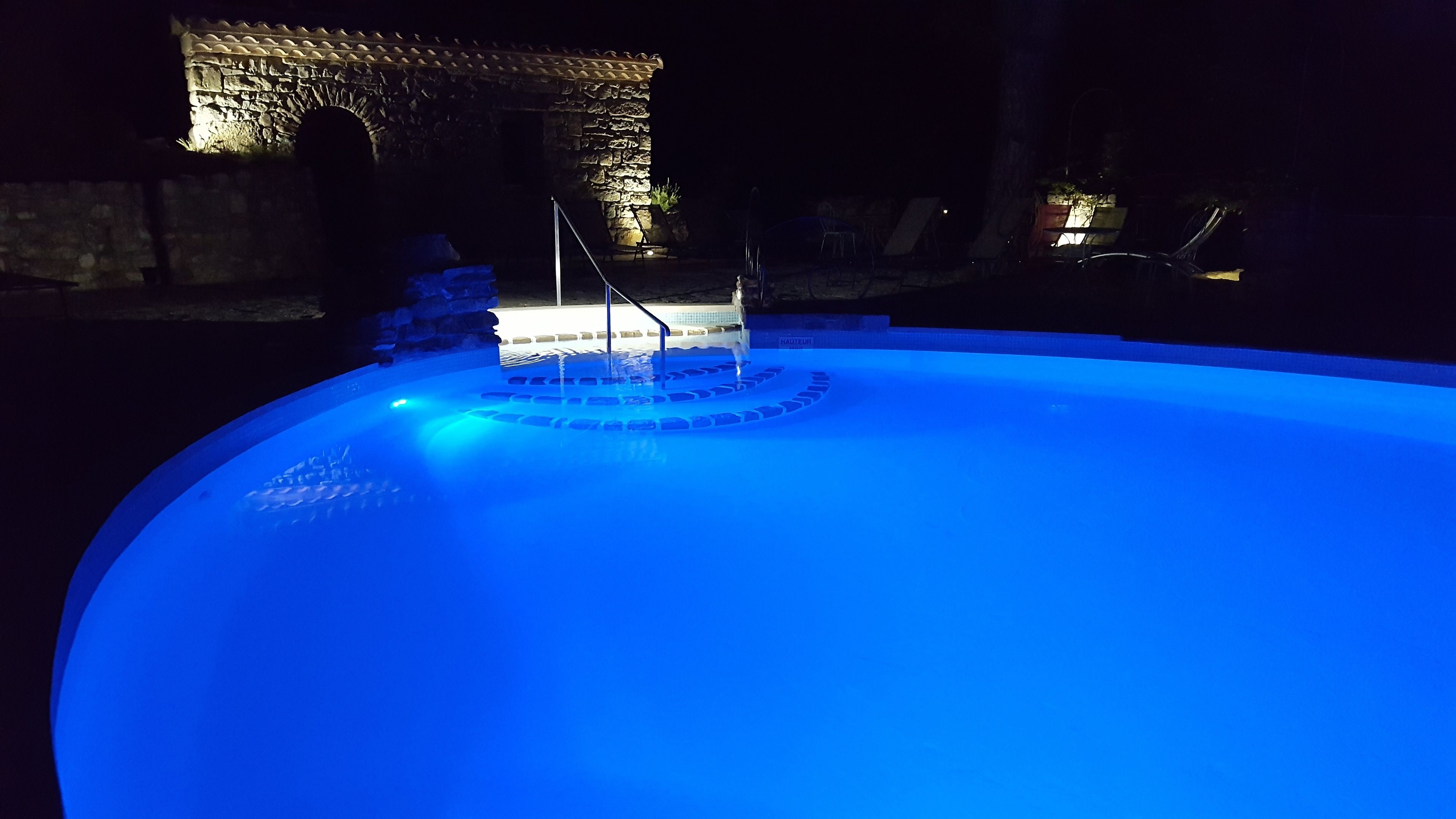 seasonal outdoor pool, open 10:00 am to 7:00 pm, pool umbrellas