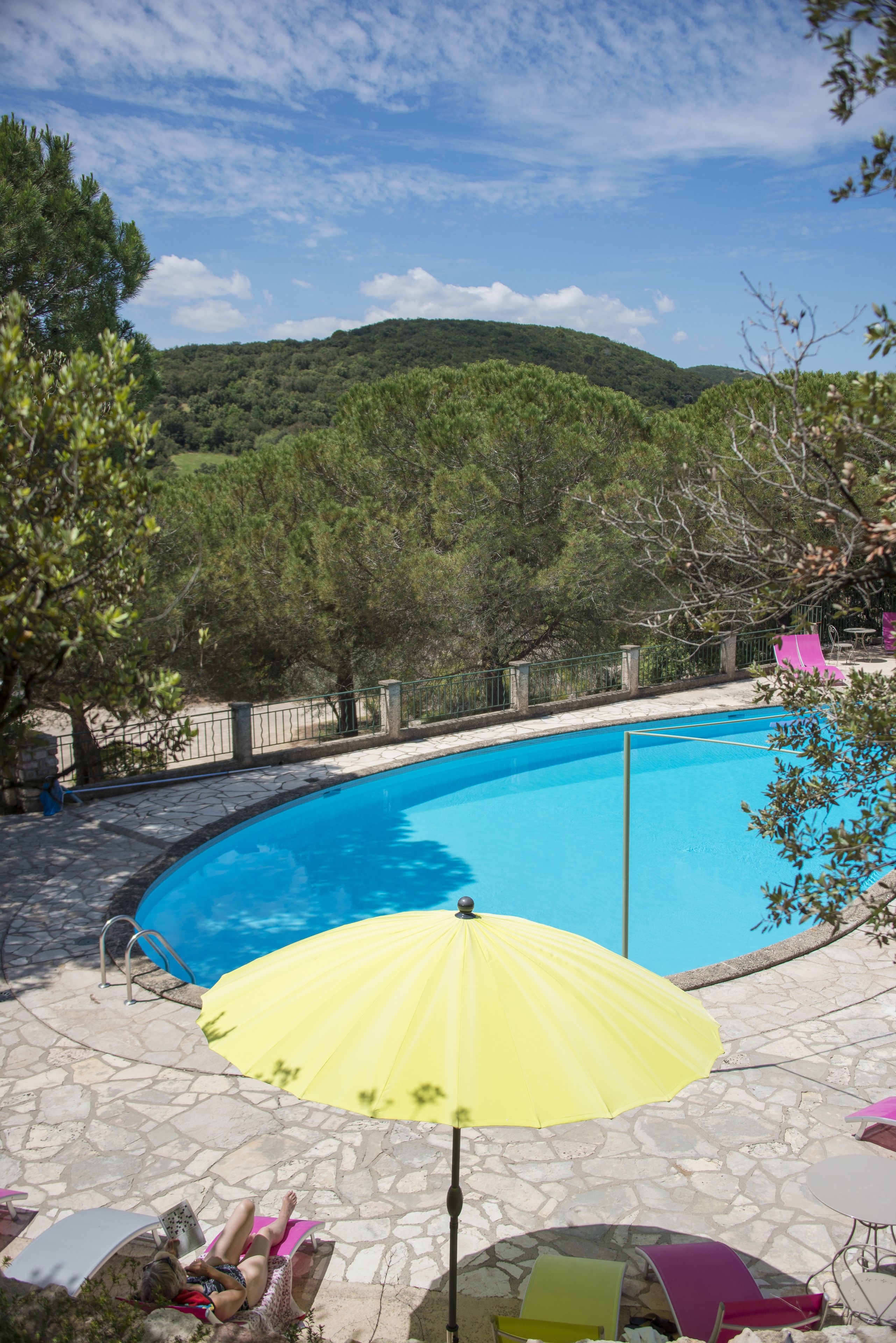 seasonal outdoor pool, open 10:00 am to 7:00 pm, pool umbrellas