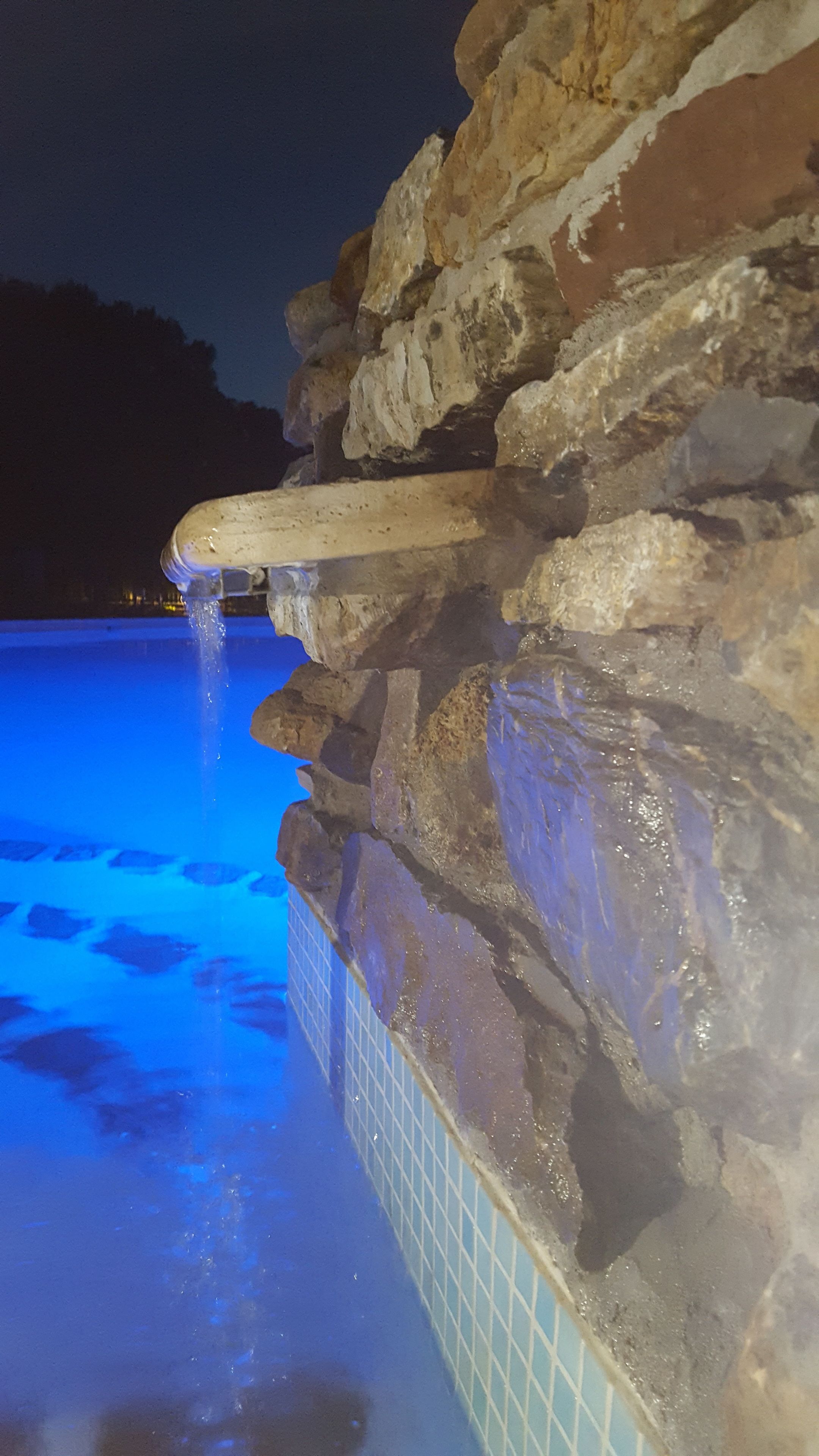 Seasonal outdoor pool, open 10:00 AM to 7:00 PM, pool umbrellas